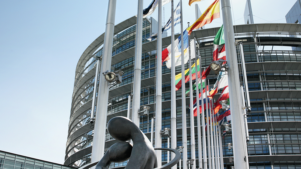 A building with flags from around the world in front