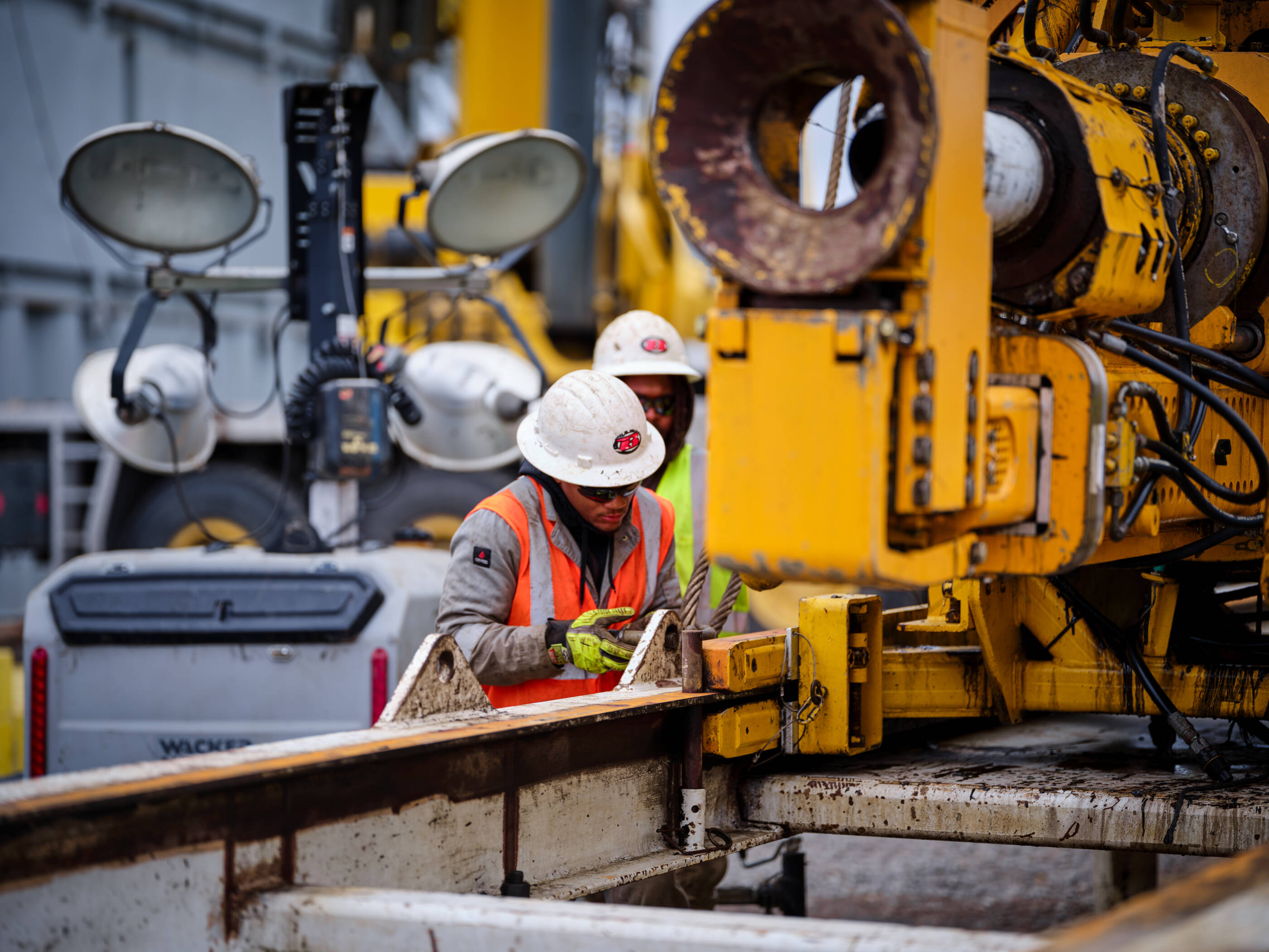 Arkansas-based team members preparing the drilling system for our lithium appraisal well. The well can reach thousands of feet below ground.