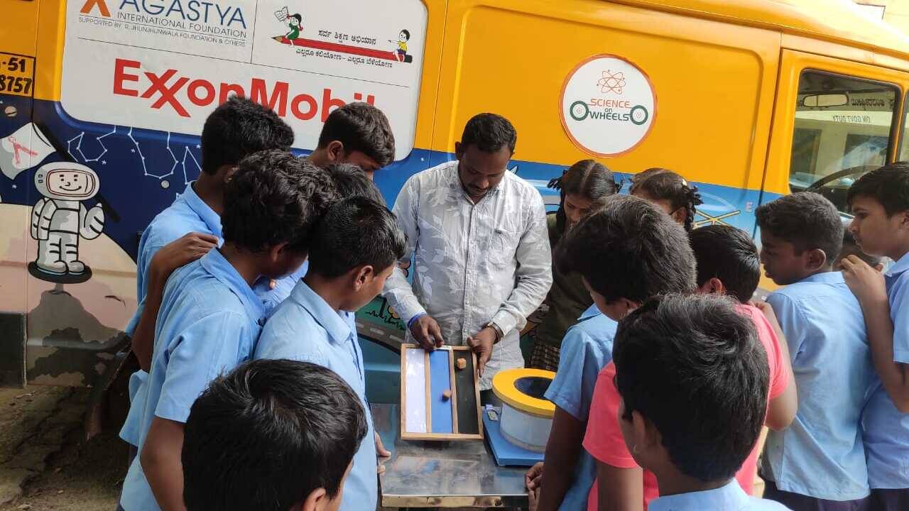 Image ExxonMobil volunteers are contributing to the effort by visiting the targeted schools along with the Agastya team and helping children perform science experiments. They are also creating awareness amongst these students about the basics of energy, such as how it is found and produced.