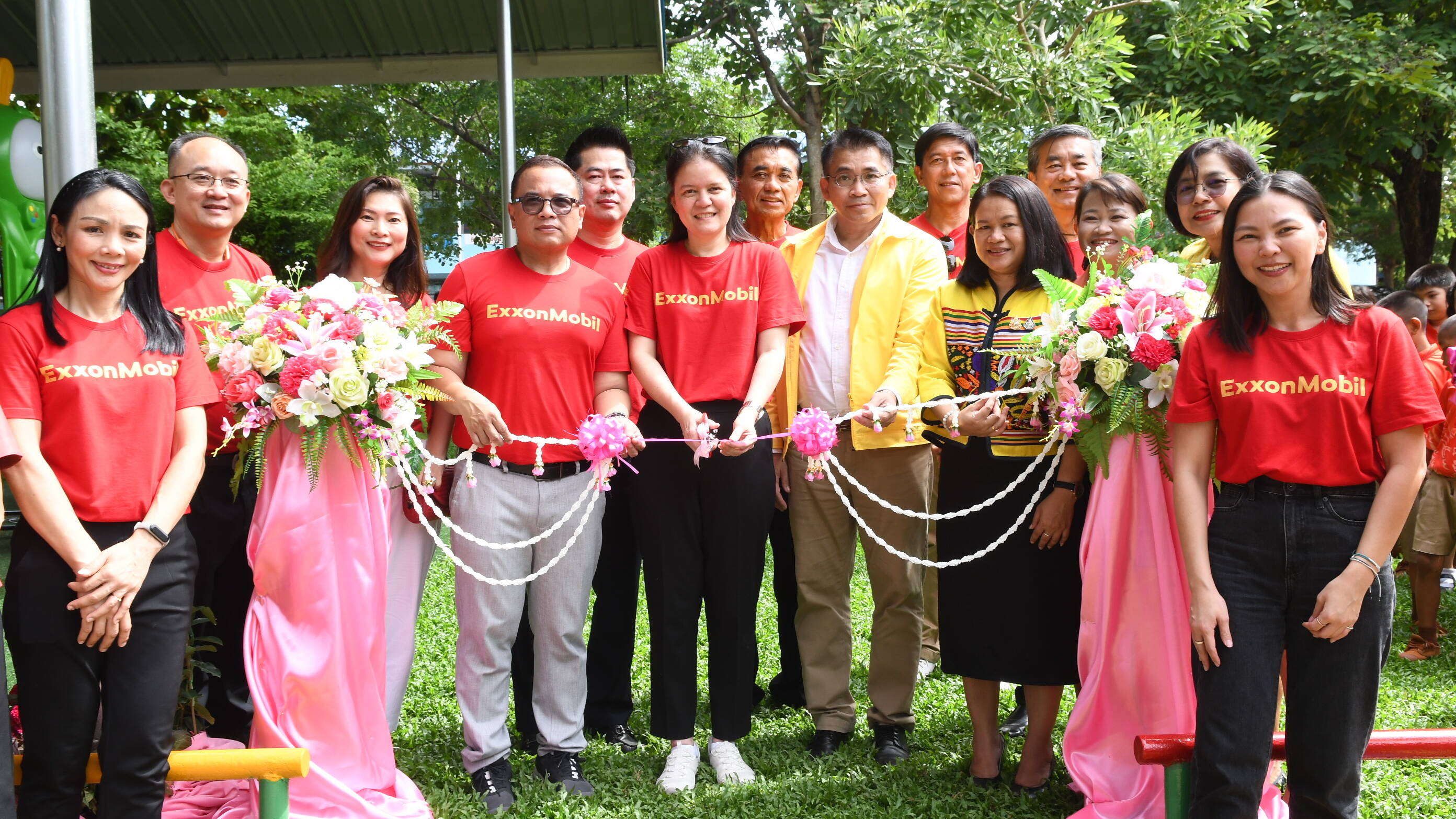 Suda Ninvoraskul, managing director of ExxonMobil Limited cut the ribbon to open the new playground with Nirandon Sooksuwanon, deputy director of Nakhon Sawan primary educational service area office 1 as witness.