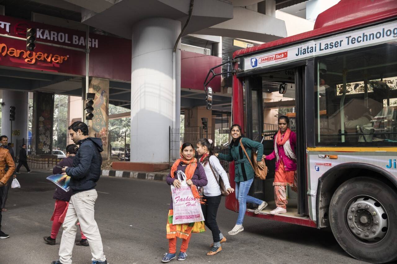 Image CNG-powered busses provide free travel for women across New Delhi.