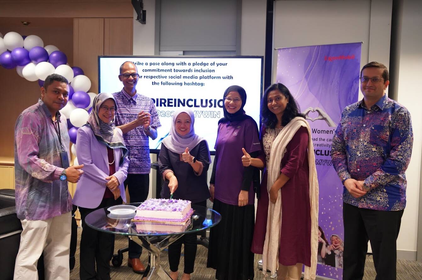 Celebrating International Women's Day in the office with Ms. Hasliza Othman, CEO of PETRONAS Carigali (2nd from left) and other colleagues.